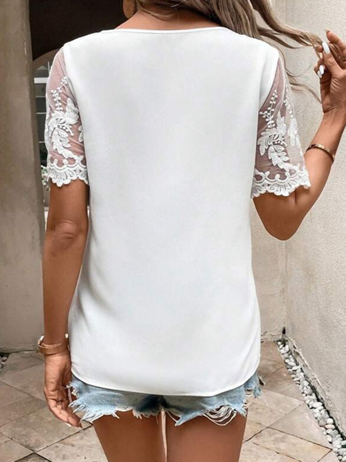 The White Asymmetrical Neck Short Sleeve Top