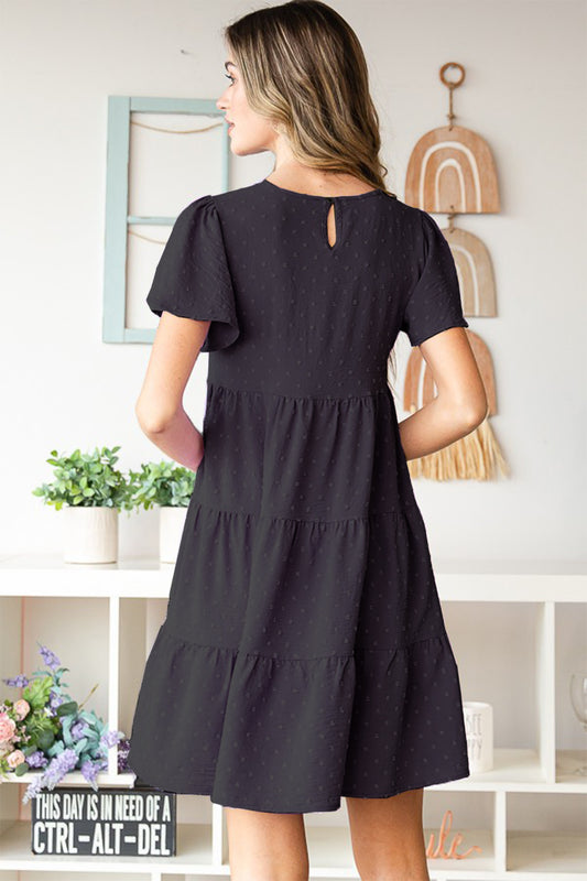 The Black Swiss Dot Short Sleeve Tiered Dress