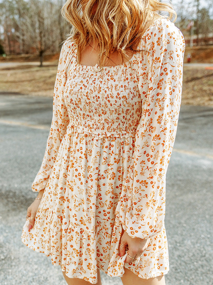 The Cream Smocked Ruffle Dress