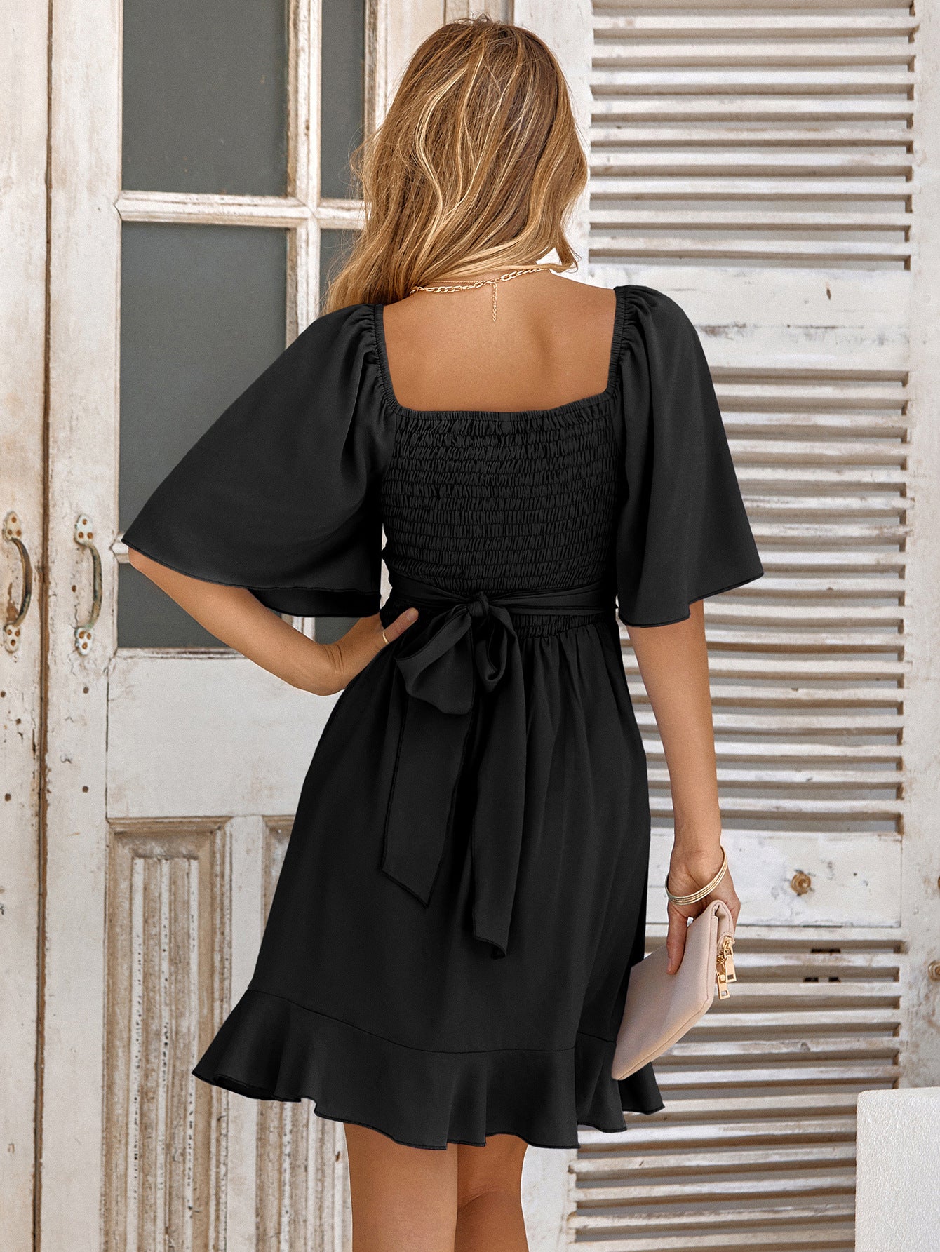 The Little Black Tie Back Ruffle Hem Dress